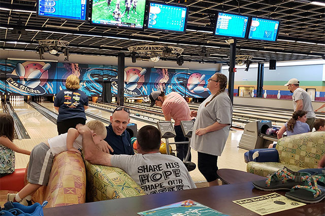 Church members bowling.